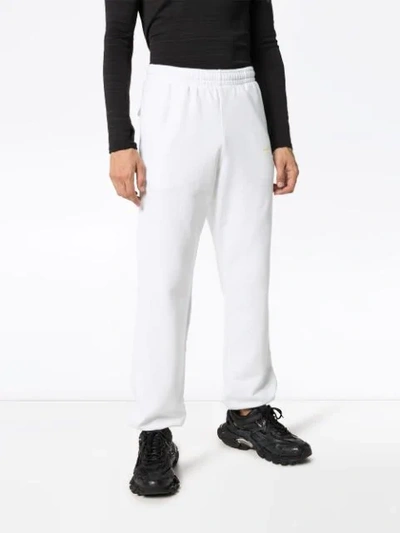 Shop Off-white Arrow Logo Track Pants In White