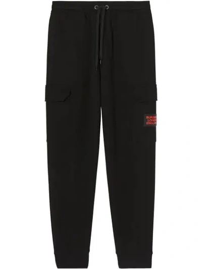 Shop Burberry Logo Appliqué Track Trousers In Black