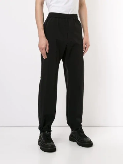 Shop Undercover Elasticated Waist Trousers In Black