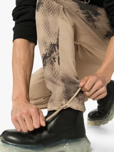 Alyx Abstract Printed Track Pants In Beg0003 Tan