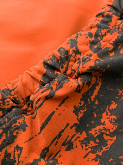 Shop Undercover Elasticated Ufo Print Track Pants In Orange