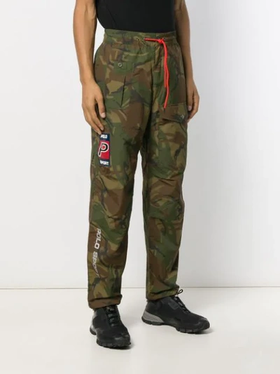 Shop Polo Ralph Lauren Camouflage-print Trousers In Green