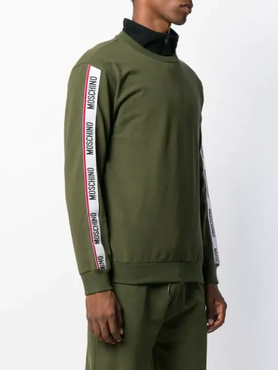 Shop Moschino Logo Tape Sweatshirt In 430 Militare