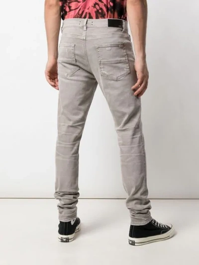 Shop Amiri Skinny-fit Jeans In Grey