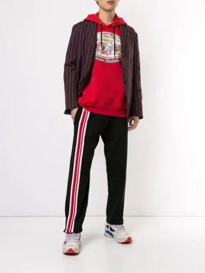 Shop Gcds Stripe Detail Logo Track Pants In Black