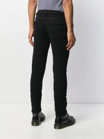 Shop Poème Bohèmien Skinny Trousers In Black