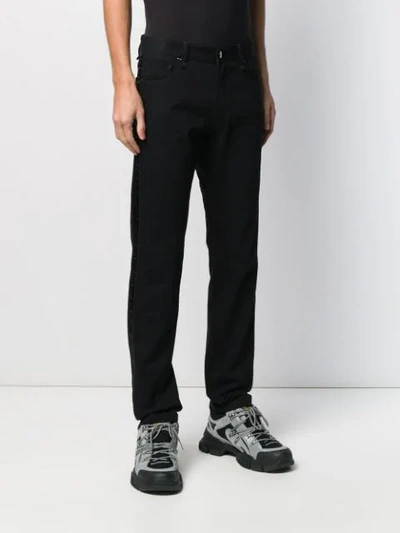 Shop Fendi Slim-fit Mid-rise Jeans In Black
