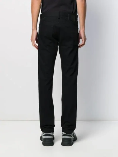 Shop Fendi Slim-fit Mid-rise Jeans In Black