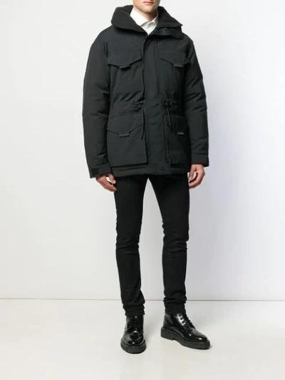 Shop Sandro Hooded Down Parka Coat In Black