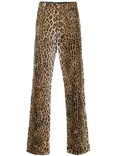 Shop Versace Leopard Print Jeans In Neutrals