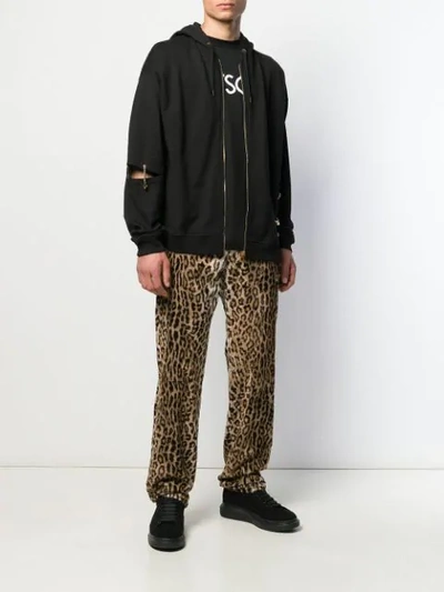 Shop Versace Leopard Print Jeans In Neutrals