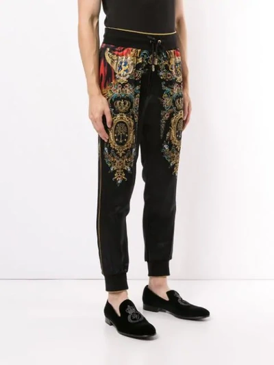 Shop Dolce & Gabbana Cuffed Heraldic-print Track Trousers In Black