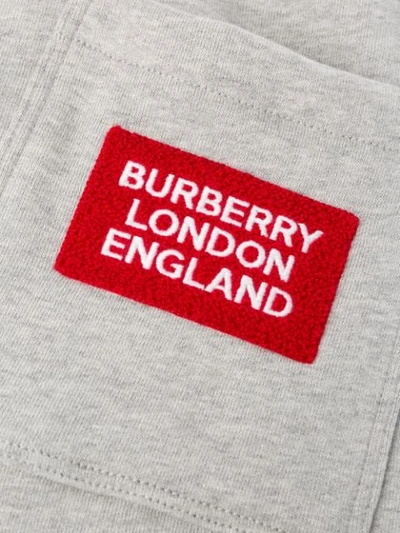 Shop Burberry Logo Appliqué Melange Track Trousers In Grey