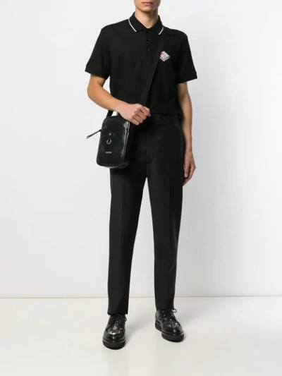 Shop Burberry Logo Embroidery Polo Shirt In Black