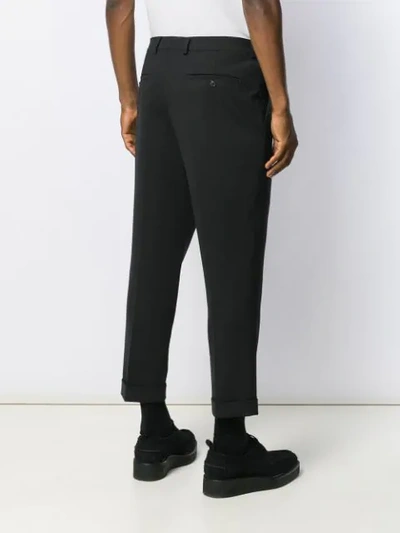 Shop Ami Alexandre Mattiussi Carrot Fit Pleated Trousers In Black