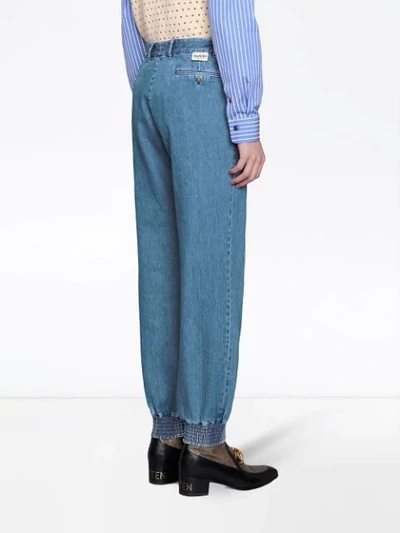 Shop Gucci Marble Washed Denim Track Pants In Blue