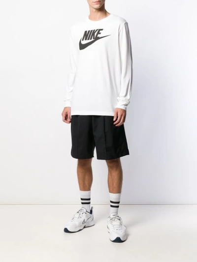 Shop Nike Logo Print Long-sleeved T-shirt In White