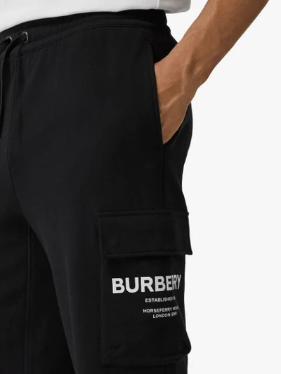 Shop Burberry Cargo Pocket Horseferry Print Track Shorts In Black