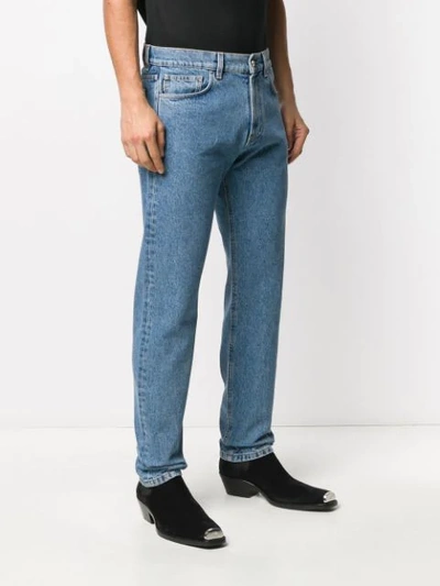 Shop Versace Embroidered Logo Straight Jeans In Blue