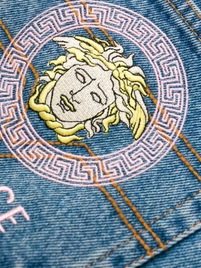 Shop Versace Embroidered Logo Straight Jeans In Blue