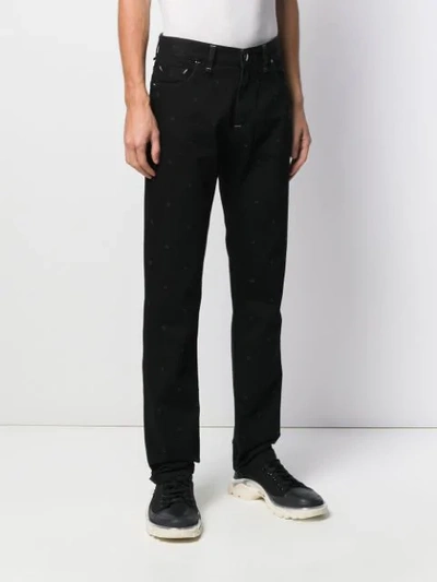 Shop Fendi Slim-fit Embroidered Monogram Jeans In Black