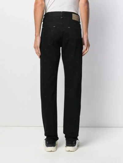 Shop Fendi Slim-fit Embroidered Monogram Jeans In Black