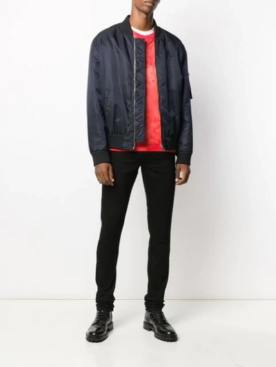 Amiri Distressed Slim Fit Jeans In Black