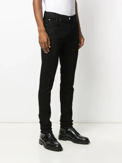 Amiri Distressed Slim Fit Jeans In Black