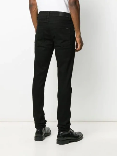 Shop Amiri Slim-fit Jeans In Black