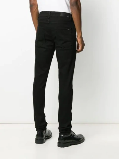 Amiri Distressed Slim Fit Jeans In Black