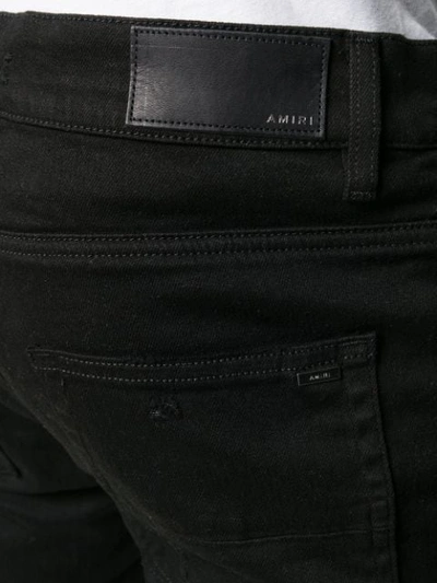 Shop Amiri Slim-fit Jeans In Black