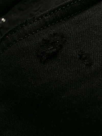 Amiri Distressed Slim Fit Jeans In Black