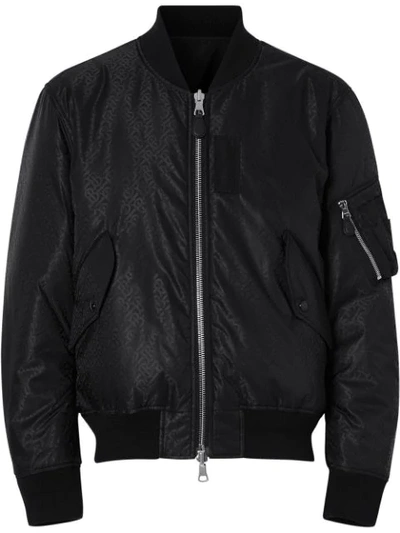 Shop Burberry Reversible Monogram Econyl® Jacquard Bomber Jacket In Black