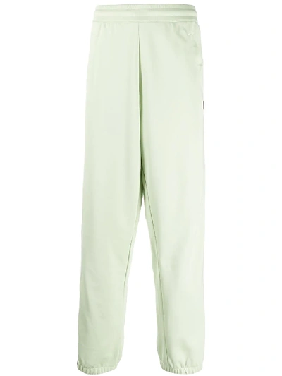 Shop Acne Studios Panelled Track Pants In Green