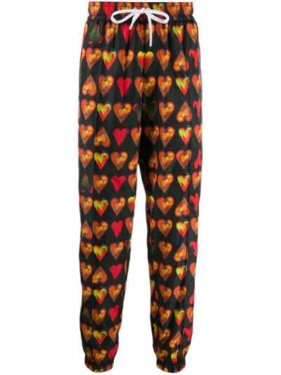 Shop Versace Watercolor Hearts Joggers In Black