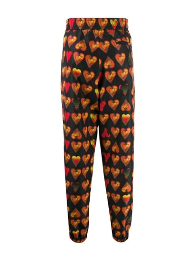 Shop Versace Watercolor Hearts Joggers In Black