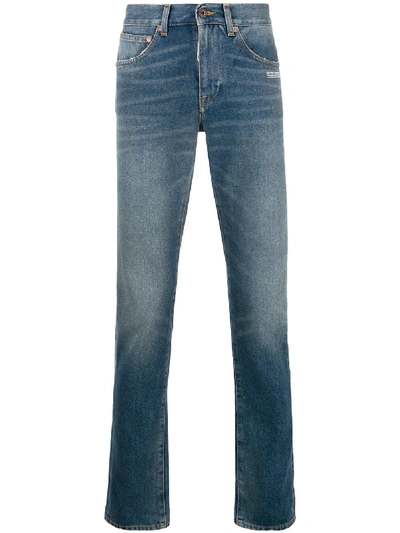 Shop Off-white Faded Slim Jeans In Blue