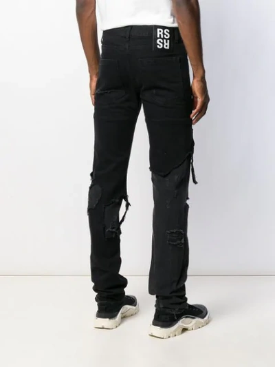 Shop Raf Simons Destroyed Slim-fit Jeans In Black