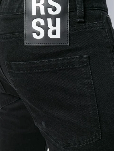 Shop Raf Simons Destroyed Slim-fit Jeans In Black