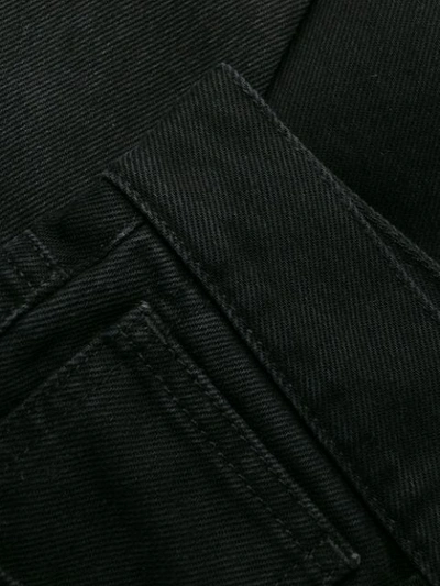Shop Raf Simons Destroyed Slim-fit Jeans In Black