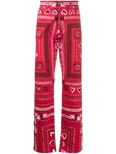 Shop Versace Bandana Print Wide-leg Trousers In Red