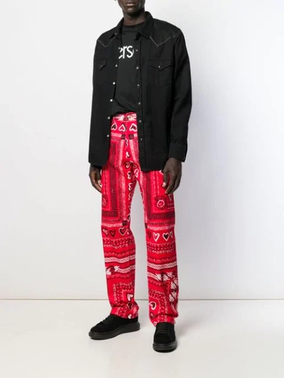 Shop Versace Bandana Print Wide-leg Trousers In Red