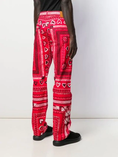 Shop Versace Bandana Print Wide-leg Trousers In Red
