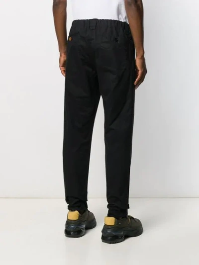 Shop Johnundercover Plain Regular Trousers In Black