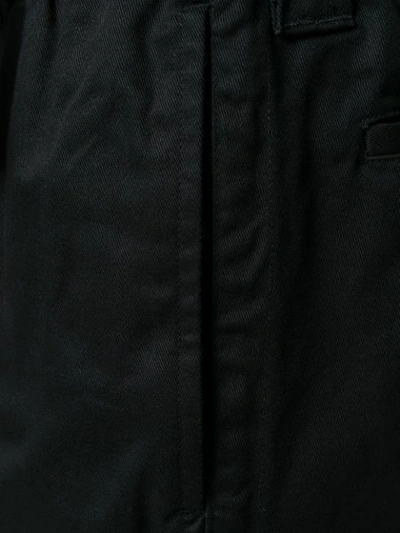 Shop Johnundercover Plain Regular Trousers In Black