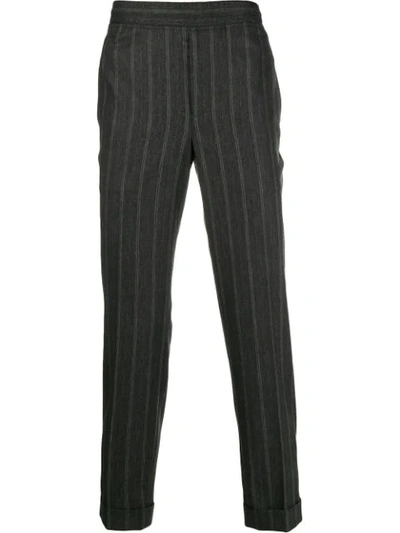 Shop Neil Barrett Striped Tapered Trousers In Grey