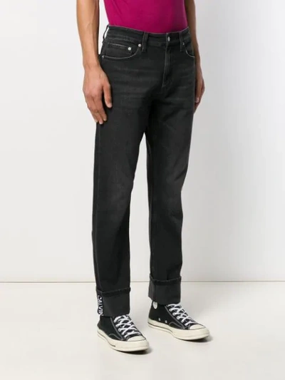 Shop Calvin Klein Jeans Est.1978 Ripped Detail Jeans In Black