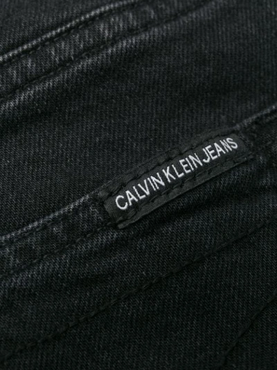 Shop Calvin Klein Jeans Est.1978 Ripped Detail Jeans In Black