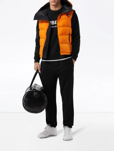 Shop Burberry Hooded Puffer Gilet In Orange