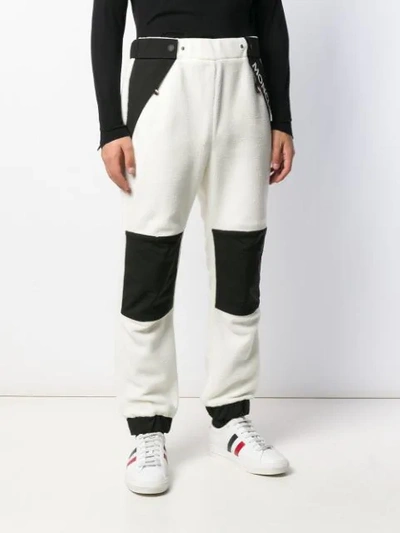 Shop Moncler Side Button Fleece Trousers In White